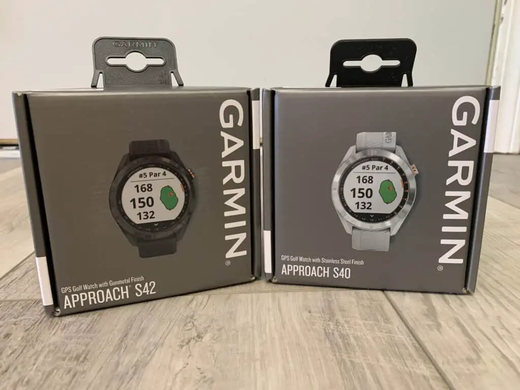 Boxed up golf watches, Approach S42 and S40
